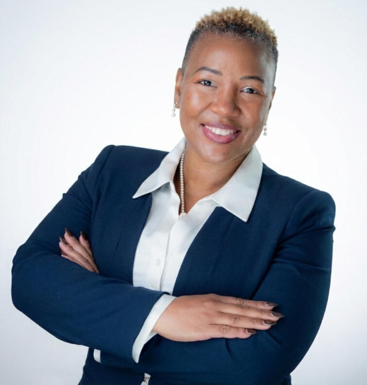 Tameca N. Brown, Founder of BOLD Strategies Consulting, professional headshot in navy blazer.